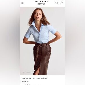 THE SHIRT
Light Blue Button-Up Shirt